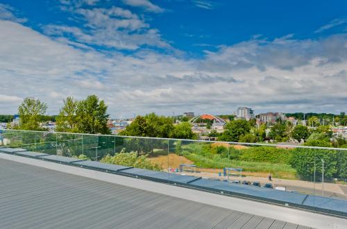a view of a city from the roof of a building at Unique Baltic Apartments - Apartament z garażem in Kołobrzeg