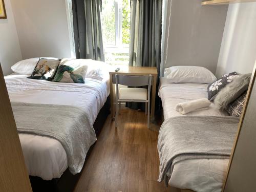 Cama o camas en una habitación en un apartamento cerca de Paulista y metro
