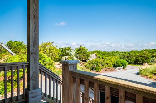 a view from the deck of a house at Turtle Watch Too by Oak Island Accommodations in Caswell Beach