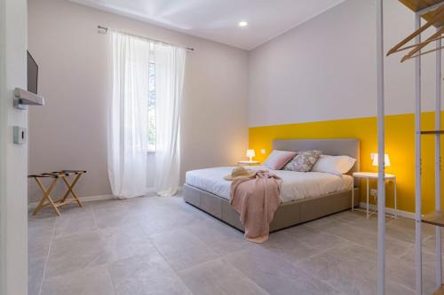 A bed or beds in a room at Luce Marmore