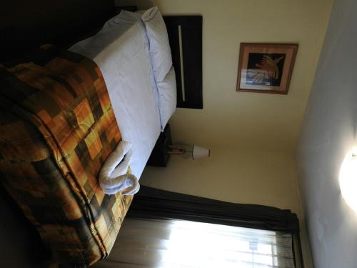 Cama o camas de una habitación en Hostal Samichay