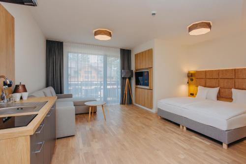 Posteľ alebo postele v izbe v ubytovaní Platinum Apartments