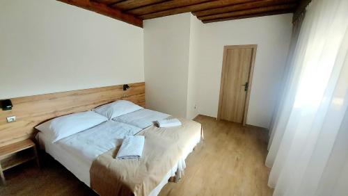 Ένα ή περισσότερα κρεβάτια σε δωμάτιο στο Apartmány Podlavice