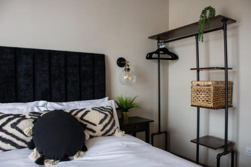 A bed or beds in a room at Plymouth Barbican boutique luxury Apartment