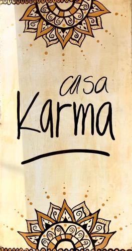 a drawing of a sign that reads a san kanza at Casa Karma in Puerto Escondido