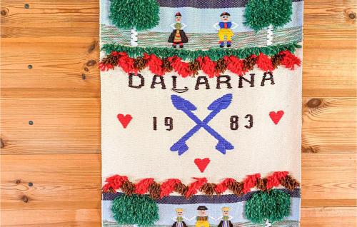 a napkin with a christmas decoration on a table at Gorgeous Home In Ludvika With Sauna in Ludvika