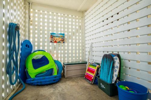 a corner of a room with a room with a room at The Anchor Holds by Oak Island Accommodations in Oak Island
