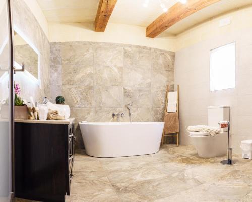 Kúpeľňa v ubytovaní Ajuga Luxury Boutique B&B