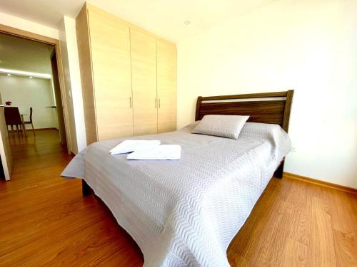 Postel nebo postele na pokoji v ubytování ItsaHome Apartments - Torre Seis