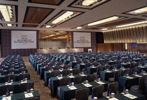 a large room with tables and chairs in it at Shangri-La Far Eastern Tainan in Tainan
