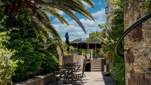 Κήπος έξω από το Hotel Abadia Tradicional