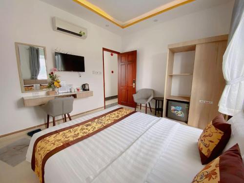 Posteľ alebo postele v izbe v ubytovaní Dương Thanh Bình