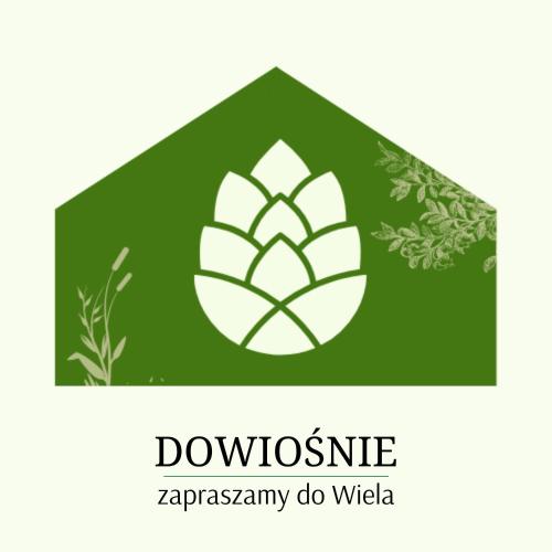 Dowiośnie - domek w Wieluに飾ってある許可証、賞状、看板またはその他の書類