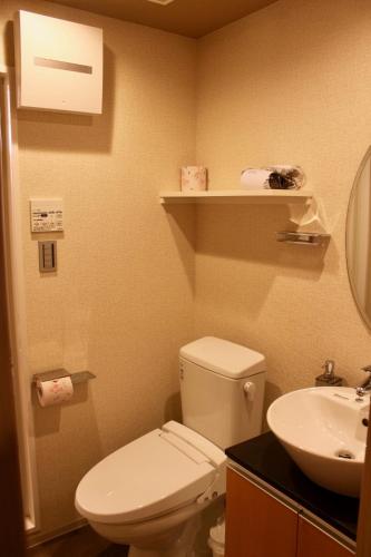 a bathroom with a white toilet and a sink at Gion Shirakawa - Vacation STAY 24783v in Kyoto