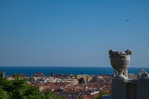 a view of the city from the top at Hôtel Petit Palais in Nice