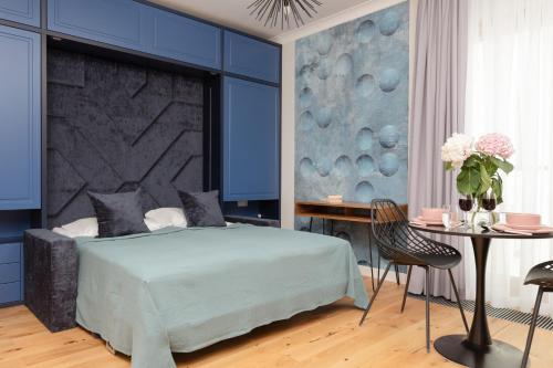 Posteľ alebo postele v izbe v ubytovaní Łazienki Park Residence by Renters Prestige
