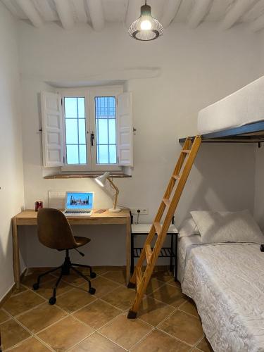 Ένα ή περισσότερα κρεβάτια σε δωμάτιο στο Casa Ofelia
