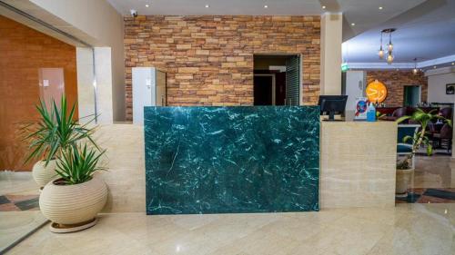 Ο χώρος του λόμπι ή της ρεσεψιόν στο Blumar El Dome Hotel