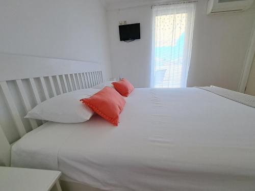 Ένα ή περισσότερα κρεβάτια σε δωμάτιο στο Guesthouse Emma