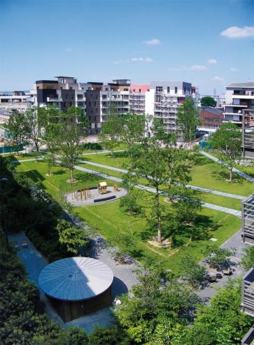 an aerial view of a park in a city at Residhome Asnieres in Asnières-sur-Seine