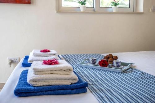 Postel nebo postele na pokoji v ubytování Villa Sorelle