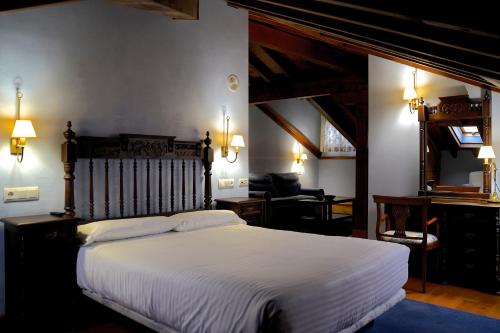 Posteľ alebo postele v izbe v ubytovaní Hotel Valle De Arco