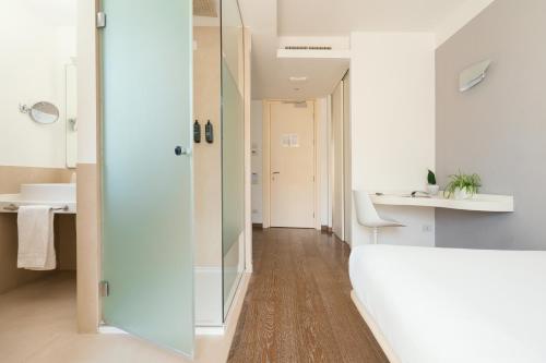 a bathroom with a shower and a sink at Life Hotel Seaview & Spa in Porto Recanati