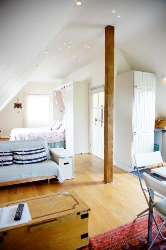 Katil atau katil-katil dalam bilik di Fosse Farmhouse Holiday Cottages