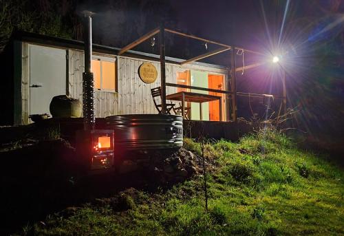 a house at night with a light in front of it at RiverHouse - Near River - Near Ocean - Near Porto in Porto