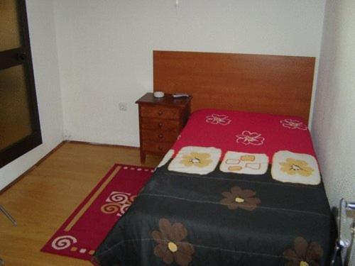 Katil atau katil-katil dalam bilik di Residencial S Juliao AL