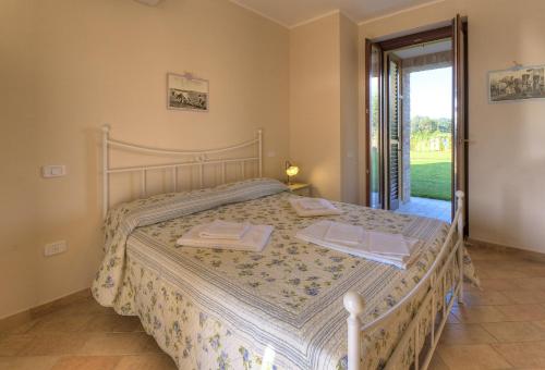 Llit o llits en una habitació de Residence Casale Torrenova al Conero