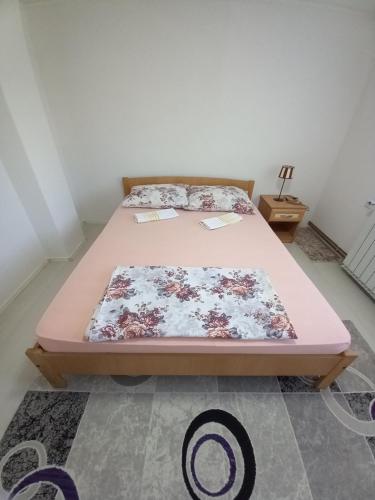A bed or beds in a room at Apartment Maida