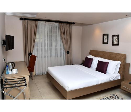 Postel nebo postele na pokoji v ubytování Hillpark Hotel