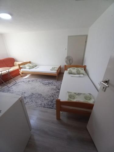Postel nebo postele na pokoji v ubytování Apartment Maida