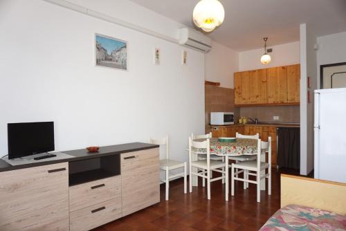 Fotografia z galérie ubytovania Cozy 1 bedroom apartment with shared pool and lift v destinácii Porto Santa Margherita di Caorle