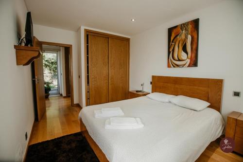 Postel nebo postele na pokoji v ubytování Casa da Quinta - Quinta da Portela