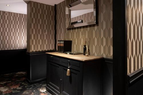 Cuisine ou kitchenette dans l'établissement Hôtel Edmond W Lyon Part-Dieu