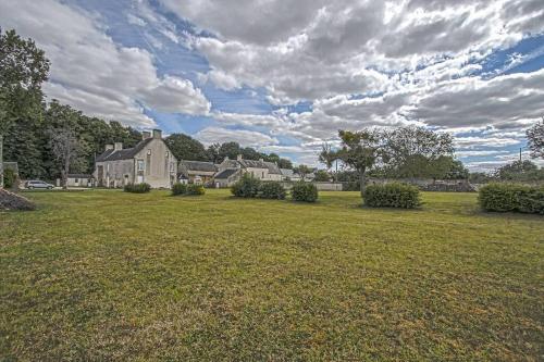 a large yard with a large house in the background at BANVILLE 330 