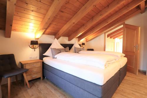 Кровать или кровати в номере Landhaus Am Schelmenhag 13a