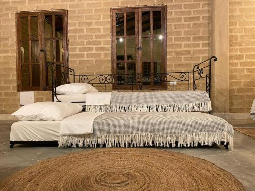 Łóżko lub łóżka w pokoju w obiekcie Privada y comoda cabaña, Casa Margarita, Villavieja