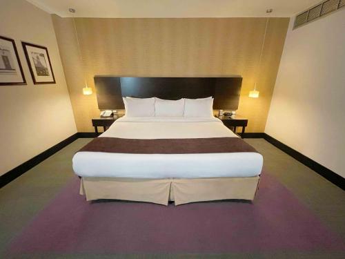 Postel nebo postele na pokoji v ubytování Hotel Trinitarias Suites