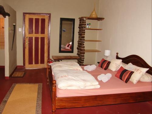 Postel nebo postele na pokoji v ubytování Roidina Safari Lodge