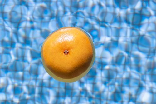 an orange is sitting on top of a blue at Novotel Monte-Carlo in Monte Carlo