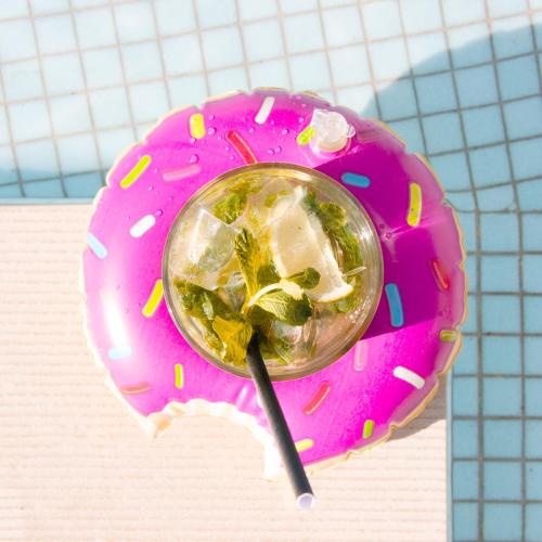 a drink in a pink object with a spoon in it at Novotel Monte-Carlo in Monte Carlo