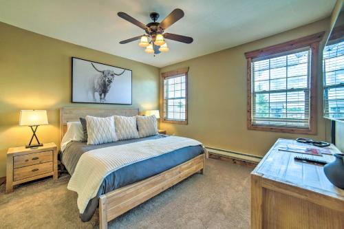 a bedroom with a bed and a ceiling fan at Cozy Driggs Condo about 40 Mi to Grand Teton NP! in Driggs
