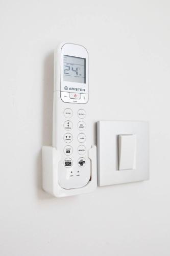 an ipod is plugged into an electrical outlet at Luxury 6 bedroom house on waterfront in Perast