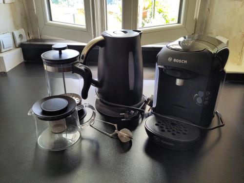 a coffee maker sitting on top of a counter at Le Gite de la Loire in Rochecorbon