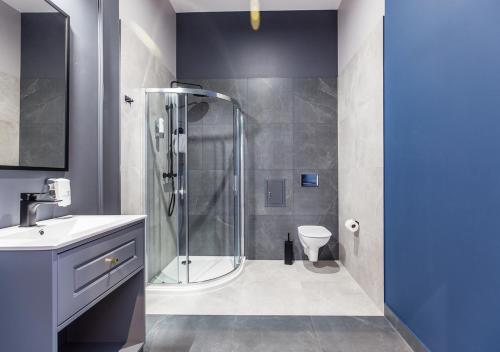 A bathroom at Aparthotel Cracovia Residence