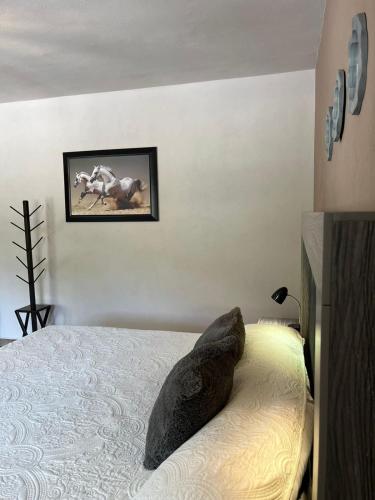 Cama o camas de una habitación en Cabañas Rancho San Jorge