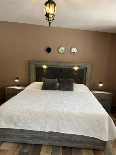 Cama o camas de una habitación en Cabañas Rancho San Jorge